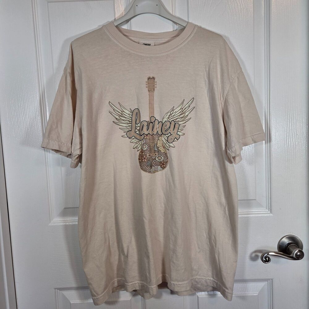 Lainey Wilson Womens MEDIUM Cream Winged Guitar Graphic Tee Shirt 100% Cotton